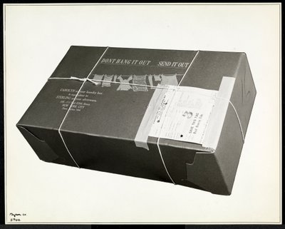 A Packed Box of Laundry from the Carolyn Laundry at 111 East 128th Street, East Harlem, New York by Byron Company